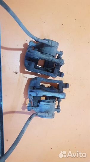 Суппорт тормозной передний на Mercedes W202