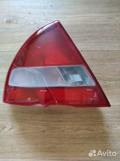 Фара mitsubishi lancer 1998