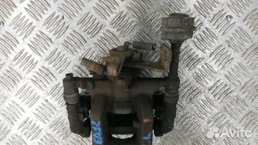 Суппорт тормозной задний левый opel astra J (LEA12