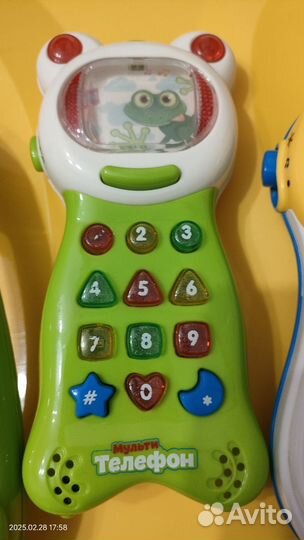 Детские игрушки телефон