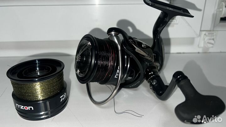 Катушка рыболовная и фидер