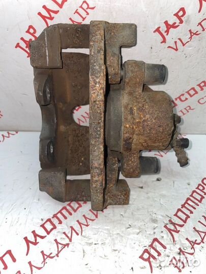 Суппорт тормозной передний правый Mazda Premacy CW