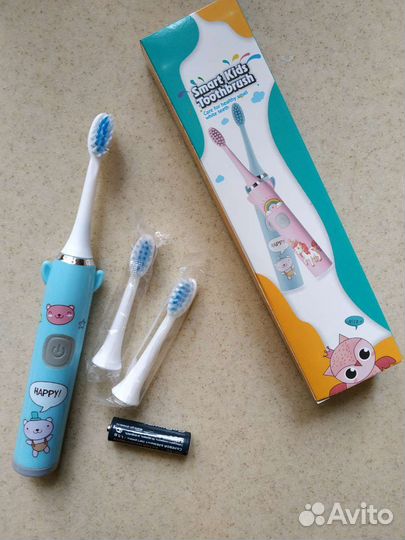 Новая электрическая зубная щетка детская