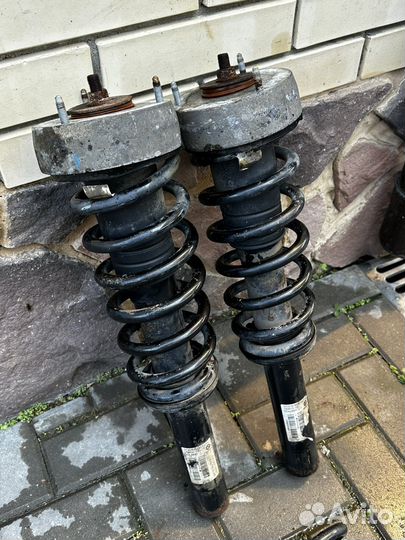 Стойки амортизаторов передние BMW E70