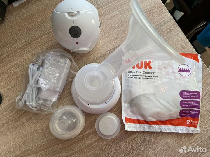 Молокоотсос электрический новый