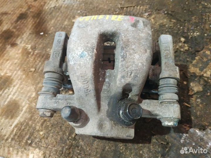 Суппорт тормозной задний правый Toyota Alphard