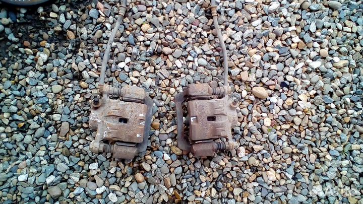 Суппорт тормозной заданий субару импреза