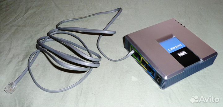 Телефонный адаптер (роутер) Linksys