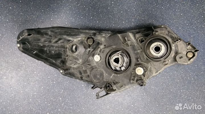 Стекло фары L Forester 2007