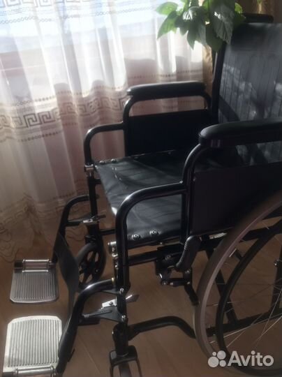 Инвалидная коляска