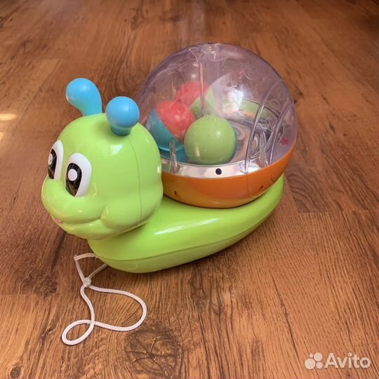 Улитка музыкальная игрушка-каталка