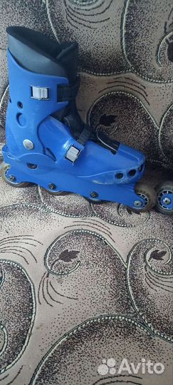 Роликовые коньки