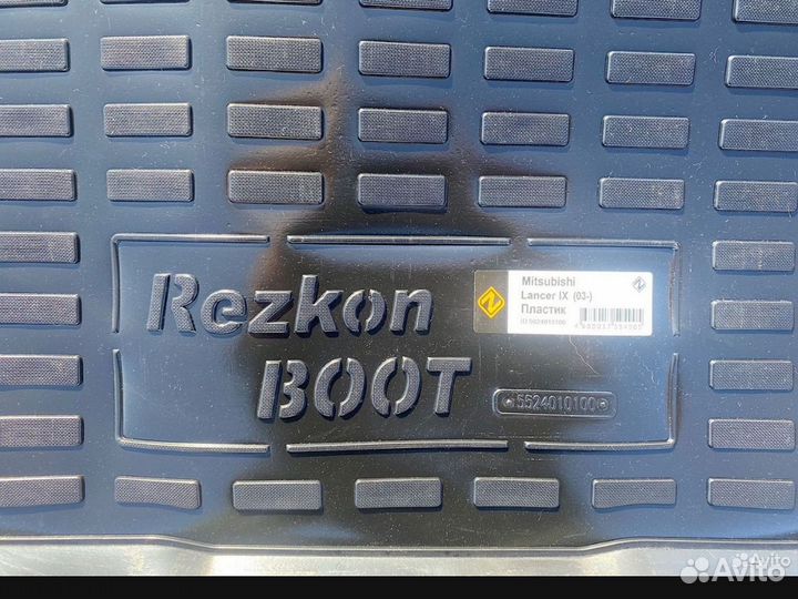 Ковер в багажник на Mitsubishi Lancer IX