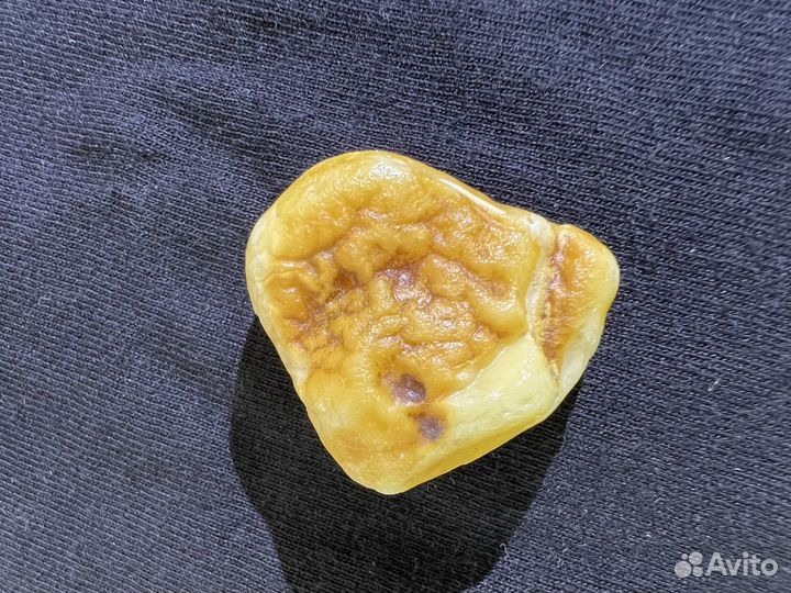 Бог Хотей в Балтийском янтаре