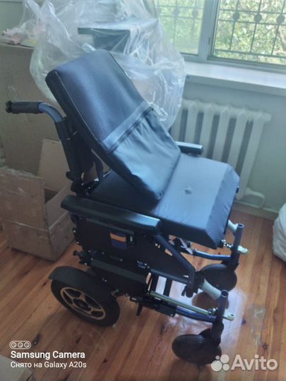 Электрическая инвалидная коляска