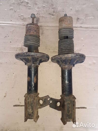 Амортизатор задний подвески Mазда 323 Ф 94-98 г