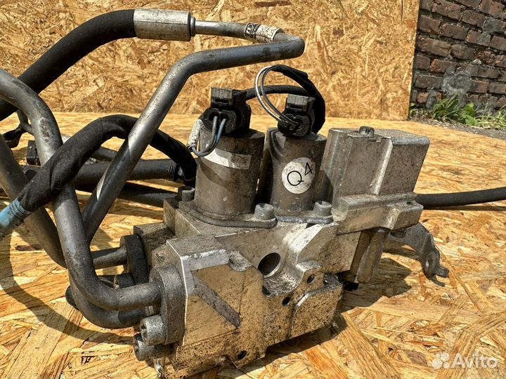 Блок клапанов передний Mercedes GL GLS A1663201158