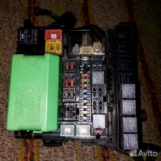 Блок предохранителей Мицубиси Лансер