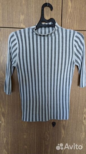 Женская одежда много