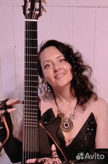 Обучение игре на гитаре / онлайн