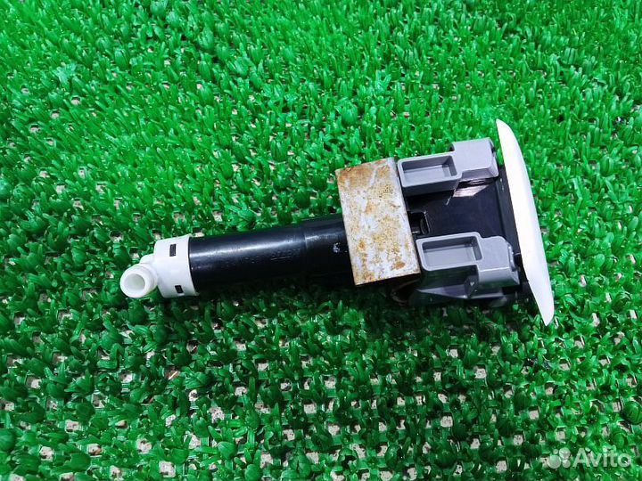 Форсунка омывателя фар левая Mitsubishi Pajero Spo