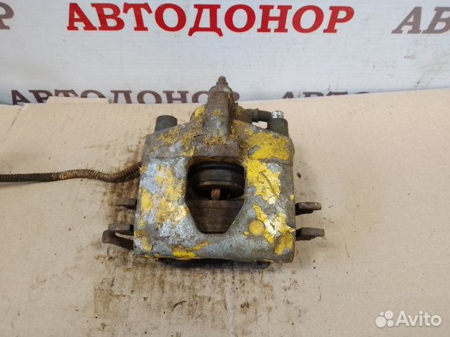 Суппорт тормозной задний правый Dodge Caravan 3.3