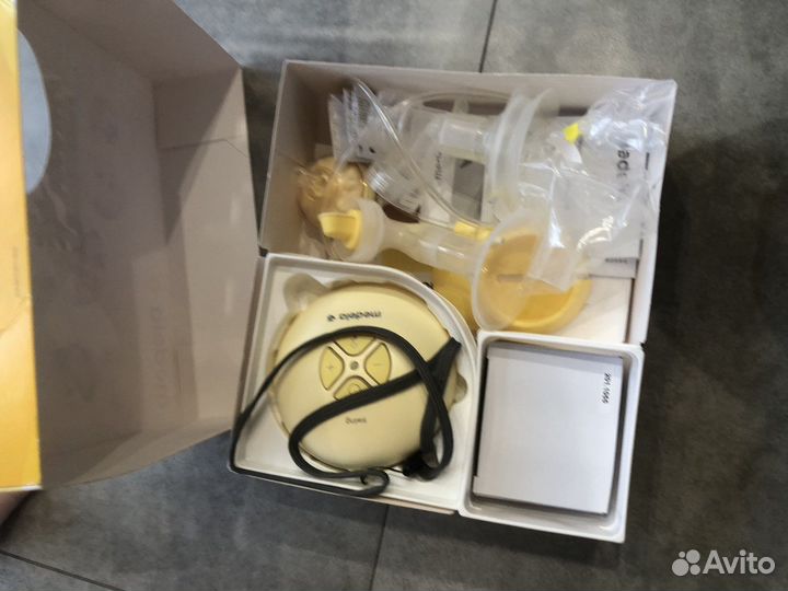 Молокоотсос medela электрический