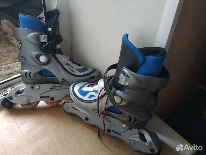 Роликовые коньки