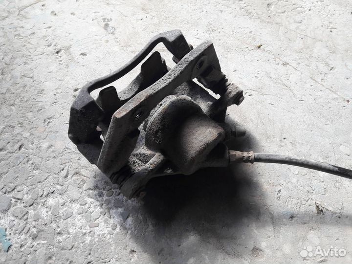 Суппорт тормозной передний левый Ford Mondeo