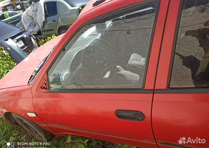 Дверь передняя левая Nissan Sunny n14