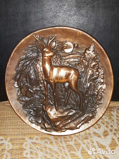 Рога лося и чеканка