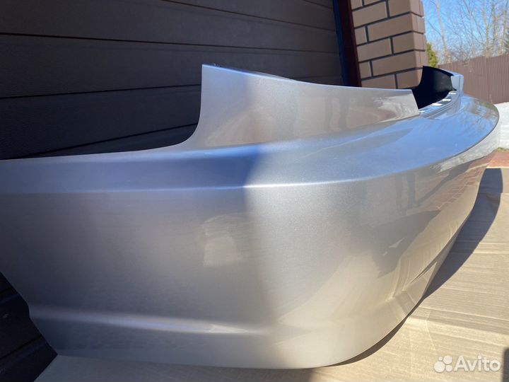 Бампер задний Kia Spectra