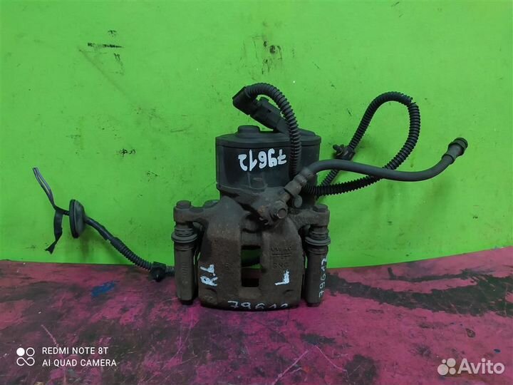 Суппорт задний левый Tiguan Passat B6 5N0615403