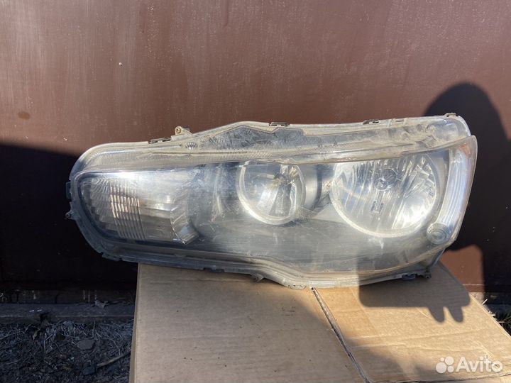 Фара левая с дефектами Mitsubishi Lancer X