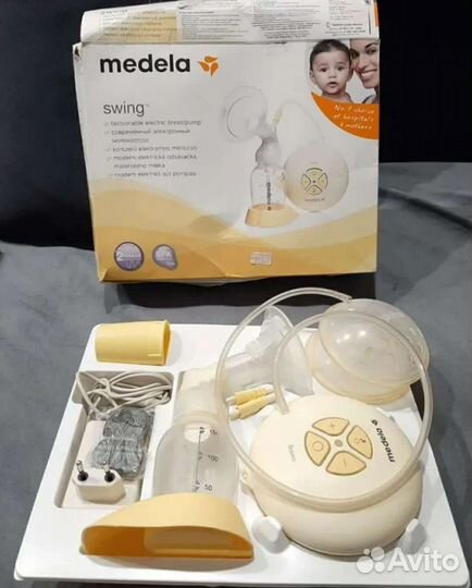 Молокоотсос medela электрический