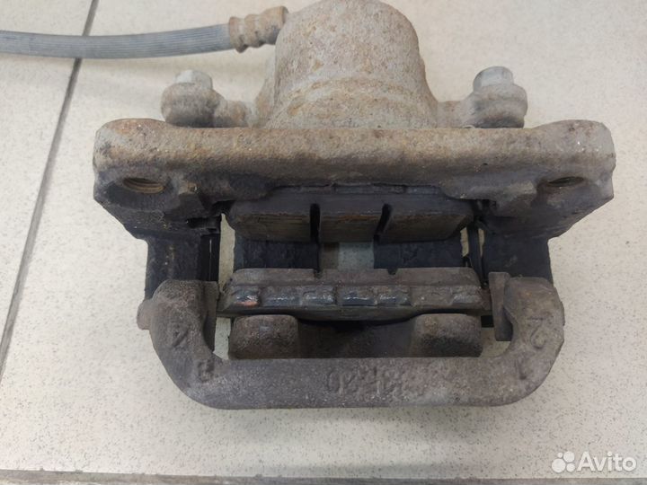 Тормозной суппорт задний правый Ниссан Кашкай J10