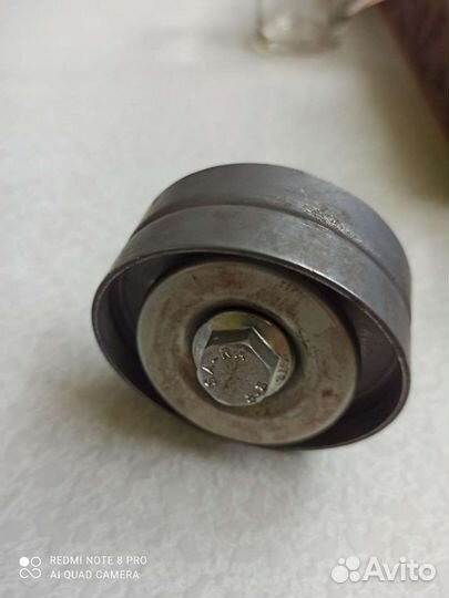 Ролик натяжителя