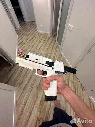 Детские игрушки пистолет