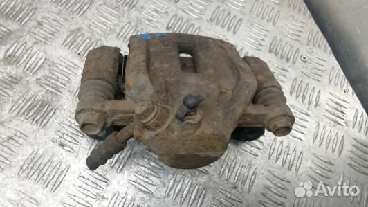 Суппорт тормозной задний правый KIA carnival 2 (KE