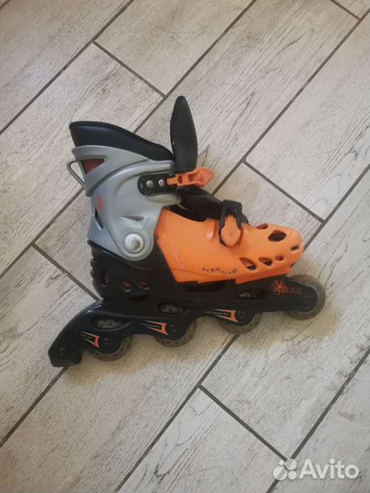 Роликовые коньки