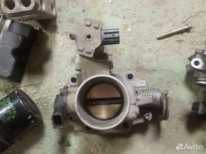 Заслонка дроссельная Mazda E9T06871