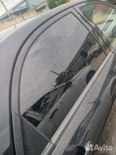 Стекло двери заднее правое Kia Cerato 2003-2007