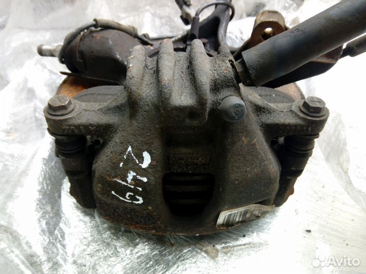 Суппорт передний левый Пежо 308