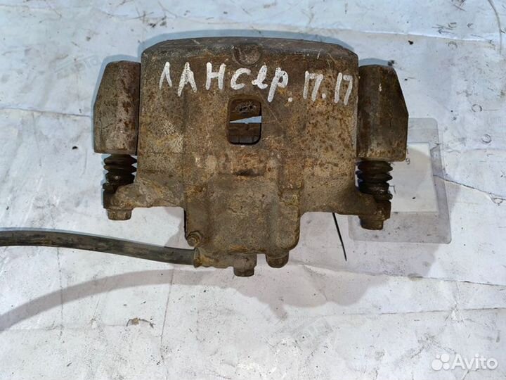 Суппорт тормозной передний правый Mitsubishi