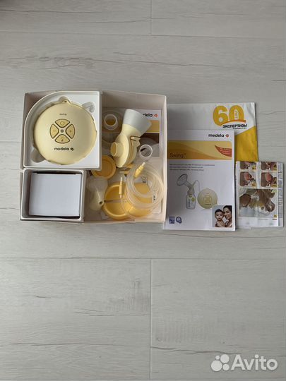 Молокоотсос medela swing электрический