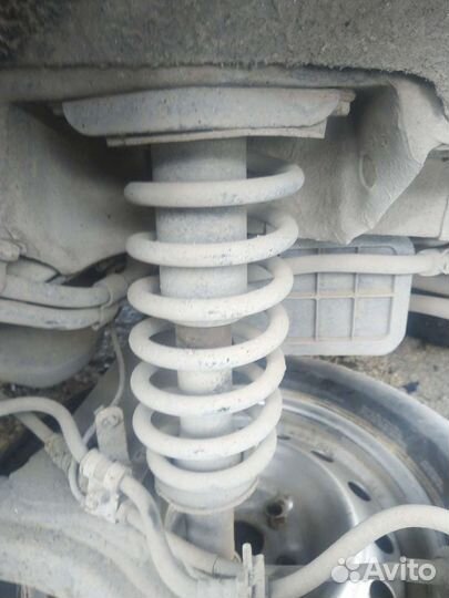 Пружина задняя Джили Эмгранд се7