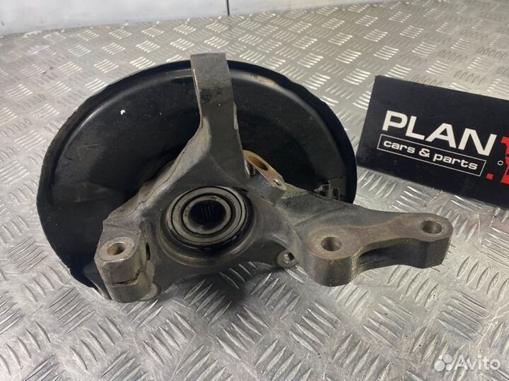 Кулак поворотный передний левый Mitsubishi Lancer