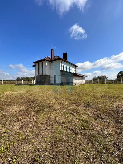 Коттедж 282 м² на участке 15 сот.