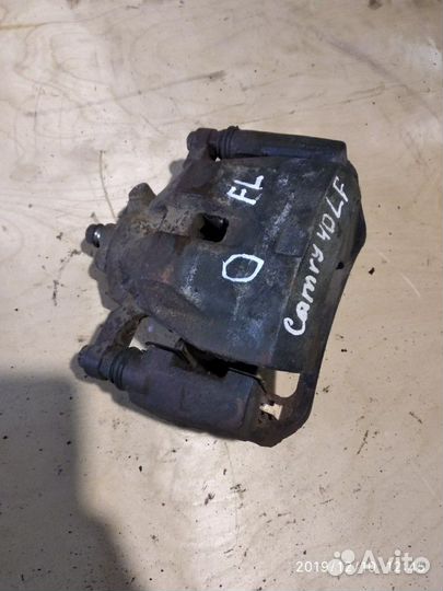 Суппорт передний левый Toyota Camry xv40 (2,4L 2az