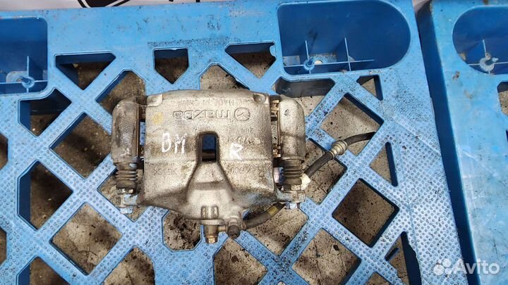 Суппорт тормозной передний правый Mazda 3 (BM/BN)